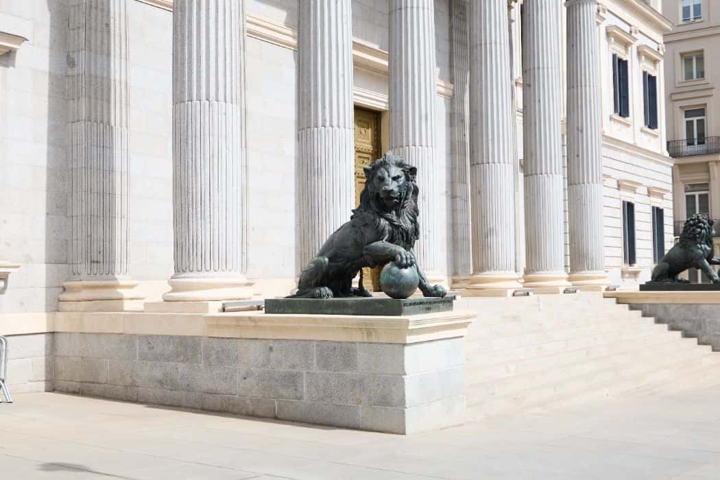 Bronze lion statue at the Congress of Deputies in Madrid