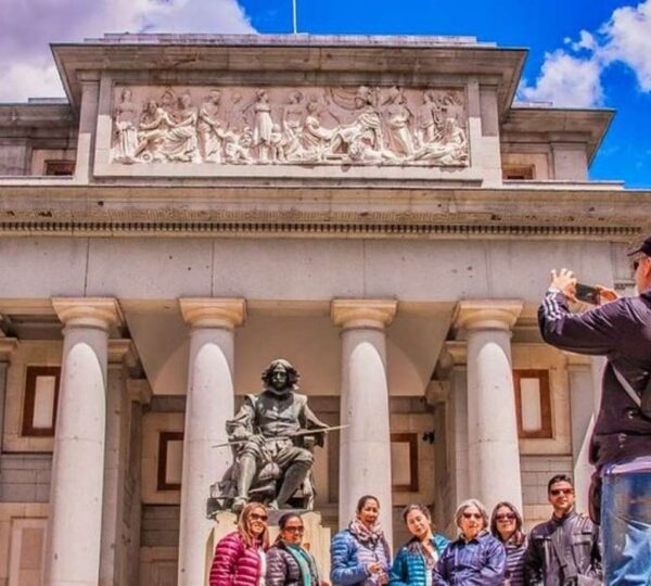 Guided tour group at the entrance of the Prado Museum in Madrid