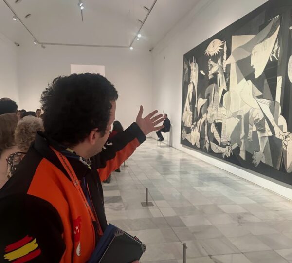 Wide view of the gallery room housing Picasso's Guernica at the Reina Sofía Museum