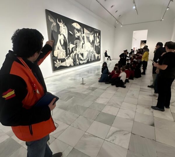 Visitors viewing Picasso's Guernica at the Reina Sofía Museum