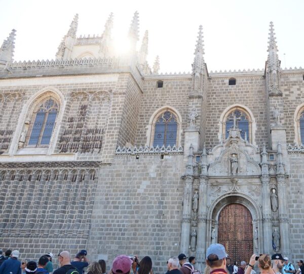 Facade of Toledo Cathedral with visitors