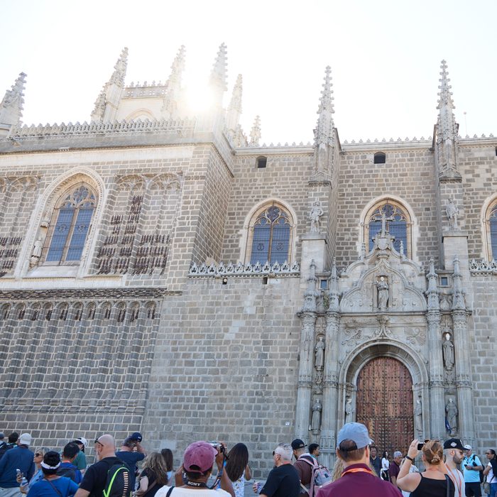 Facade of Toledo Cathedral with visitors